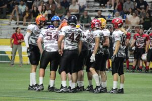 Black team huddled up
