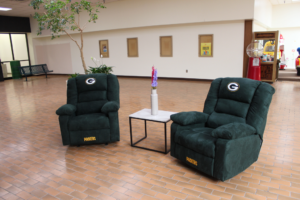 This set also comes with a matching TV stand and end table and two Greenbay Packers recliners!