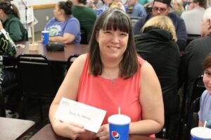 A happy oil change winner!