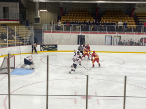 Marquette Redmen vs Hancock Bulldogs in a face-off