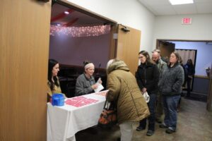 Amy and Abbie were at the doors to welcome people in