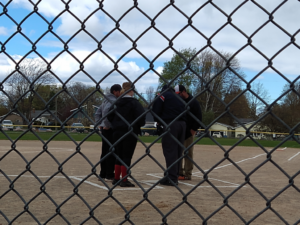 Coaches Meet on The Mound