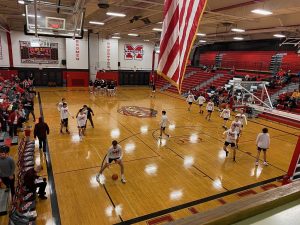 The Redmen warming up before the game