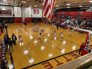 The Marquette Redettes fall to the Negaunee Miners 28-49