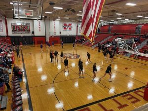 The teams warm up before the start of Tuesday nights game