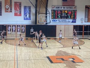 The Marquette Redmen win Conference Matchup Against Escanaba 68-49
