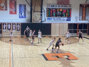 The Marquette Redmen win Conference Matchup Against Escanaba 68-49