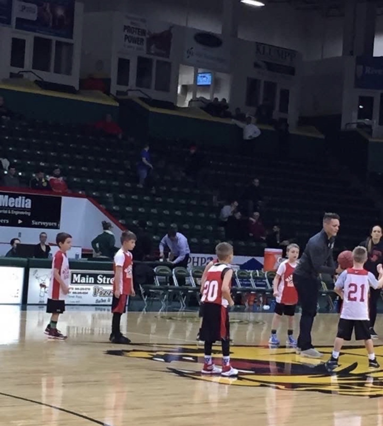 Brody Clements playing on NMU court as a kid